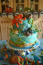 Very festive decor surrounded this "Under the Sea" party cake