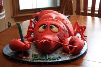 For his 1st Birthday, little Baker had a big catered lobster and clam bake party! To help him celebrate, we created this fun "Lobster" Birthday cake.